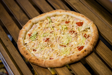 pizza on a wooden table