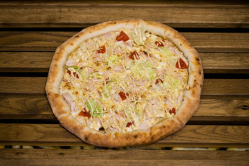 pizza on a wooden board