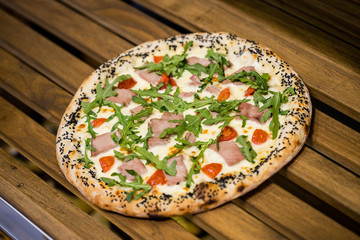 pizza on a wooden table