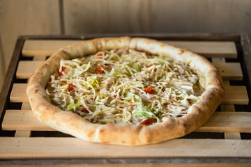 pizza on a wooden table