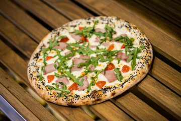 pizza on a wooden table