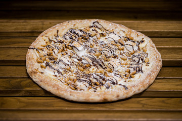 pizza on a wooden table