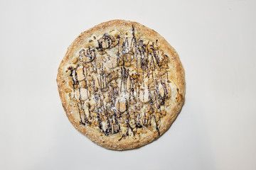 pizza on a wooden table