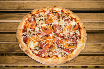 pizza on a wooden table