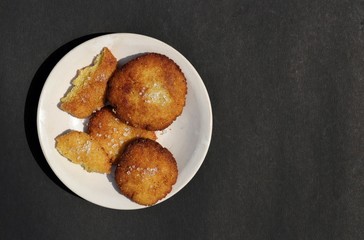Homemade Semolina Cookies in a Plate Isolated on Black Background with Copy Space for Texts Writing