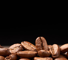 fried grains Brazil Santos, grade of Brazilian arabica on a black background