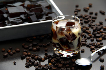 Coffee flavored jelly with milk in a glass