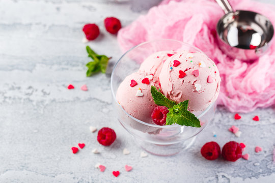 Raspberry ice cream in bowl