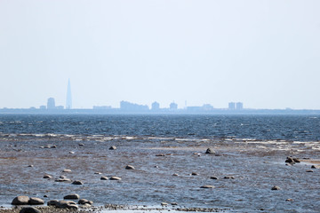 Silhouette of Saint Petersburg russia view from the beach of gulf of Finland