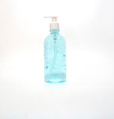 Blue sanitizer hand gel with clear plastic bottle pump on white background , hand gel prevent of corona virus , covid 19 or antibacterial hygiene 
