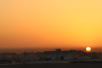 beautiful sunset over the muscat city