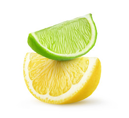 Isolated citrus fruit slices. Pieces of lime and lemon on top of each other isolated on white...