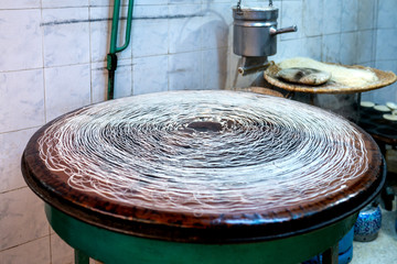 The production stages of the Antioch Kunefe dessert material, cooking kunefe kadayif, kadayif...