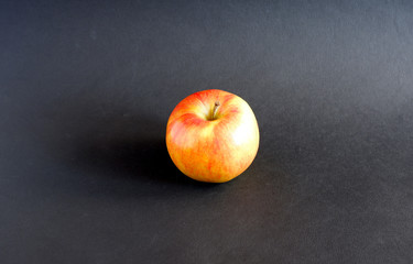 Apple on a black background. Fruit. Suitable for advertising background