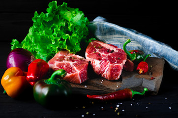 Food set for a picnic. Juicy meat steak and vegetables