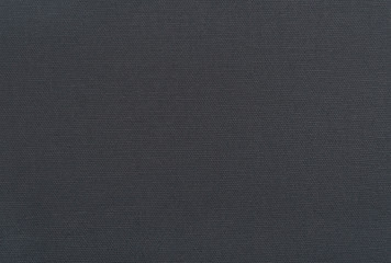 Natural linen texture background with delicate grid , dark grey black canvas texture background