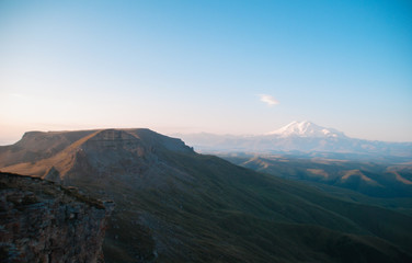 Fototapeta na wymiar Mount Elbrus, Karachay Cherkess Republic, Russian nature, plateau. The highest mountain in Europe. National Park, mountain in the snow. Dormant volcano.