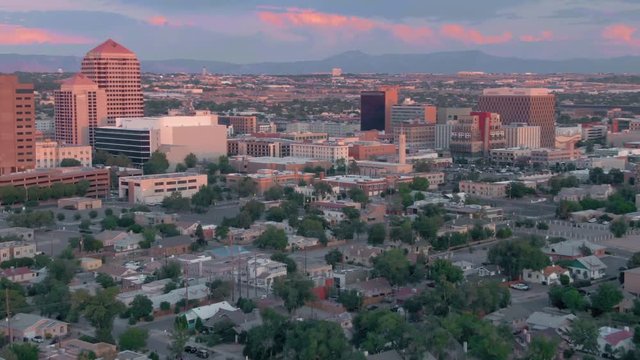 Albuquerque, New Mexico, USA.  flying over the suburbs & downtown city CBD.
