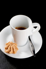 Cup of espresso coffee on the table