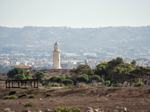A long distance view of the town and the old lighthouse of Paphos, Cyprus.
Attention: a long distance shoot on a heat day has a little effect on the sharpness of this picture (the distorting effect)