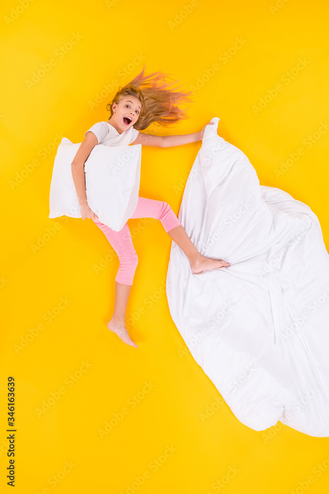 Sticker Vertical top view above high angle flat lay flatlay lie concept view of nice cheerful cheery childish girl bedtime flying having fun isolated bright vivid shine vibrant yellow color background