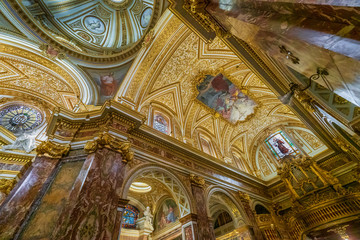 Fototapeta na wymiar Interior of Saint Anthony in Campo Marzio, a Baroque Roman Catholic church, the national church of the Portuguese community in Rome, Italy