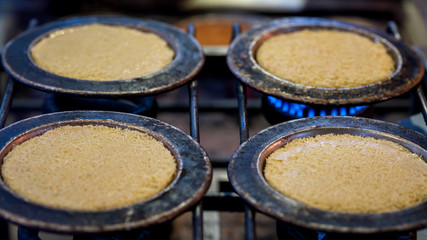 The production stages of the Antioch Kunefe dessert material. Antakya kunefe dessert, cooked and ready to serve