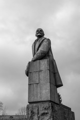 Fototapeta premium Black and white monument from granite to leader of world proletariat Lenin
