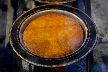 The production stages of the Antioch Kunefe dessert material. Antakya kunefe dessert, cooked and ready to serve