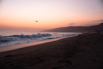 Sunset over the Ocean and the Beach