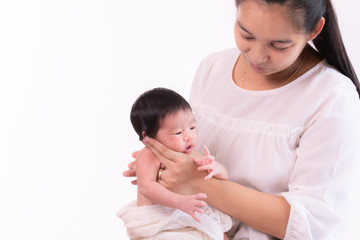 Beautiful young Asian mother hold tiny adorable newborn baby girl 0-1 month with her hand to help baby belch or Making burp after feeding with caring and love, lifestyle health care newborn at home