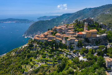 Aerial view of medieval village of Eze, on the Mediterranean coastline landscape and mountains,...