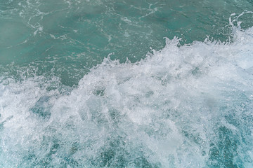 Fototapeta na wymiar Beautiful texture splashing waves foam