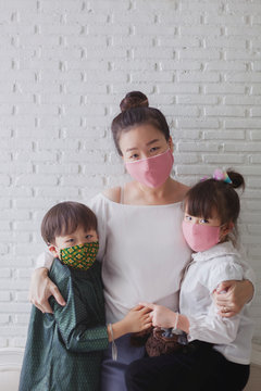 Handmade Fabric Mask For Protect PM 2.5 And Virus. Portrait. My Family Is Happy To Wearing Handmade Fabric Mask. 