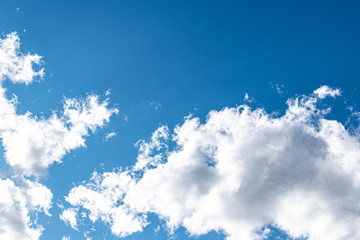 Freakish clouds on a blue sky on a sunny day