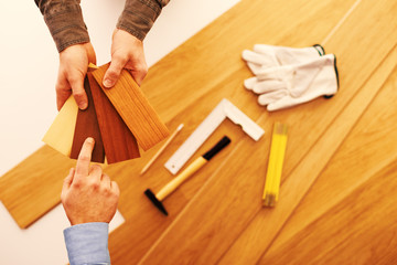 Customer choosing a wooden baseboard