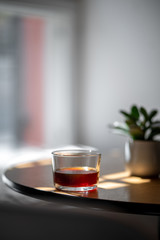 Black filter coffee on the table in cafe glass cup hario pour over cup side