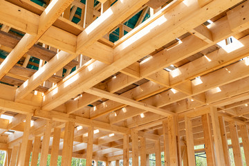 Interior frame of new wooden house under construction
