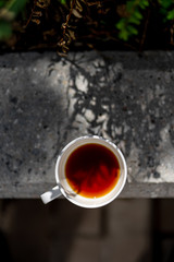 Black filter coffee on the table in cafe glass cup hario pour over cup side