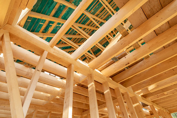 New interior residential wooden construction house framing