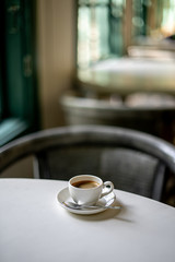 Black filter coffee on the table in cafe glass cup hario pour over cup side