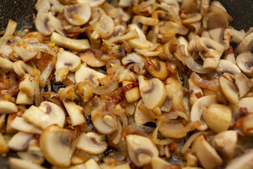 Fried mushrooms with onions top view