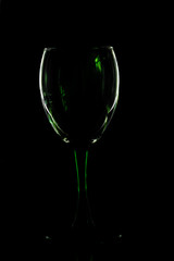glass fuselage with multicolored glare of light on a dark background