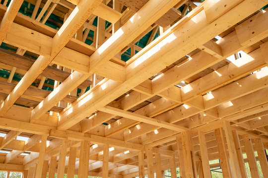 New interior residential wooden construction house framing
