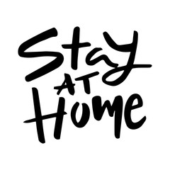 stay at home - vector black ink handwritten text isolated on a white background. The call to stay home (on self-isolation) during the global coronavirus pandemic (covid19)