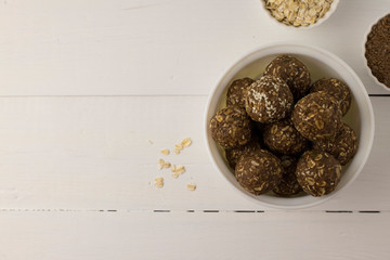 Oat and nut home made energy balls in a bowl
