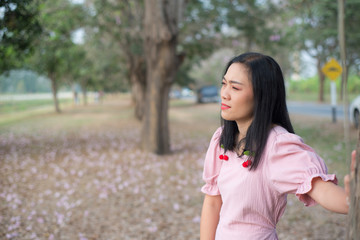 Fototapeta premium Asian woman take picture on field show travel nature concept