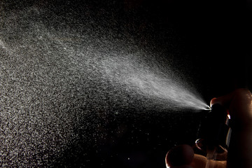 jet of water from the sprayer on a black background