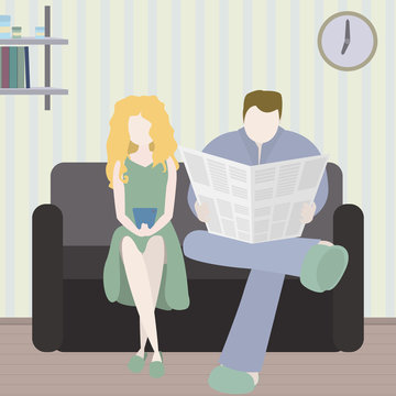 Husband and wife are watching the morning news..A man and a woman are sitting in the living room and reading the news, one from the phone, the other from the newspaper.