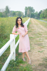 Asian woman take picture on field show travel nature concept